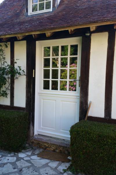 Porte d'entrée de chez ATULAM monté près de Conches en ouche par Leroy Fermetures