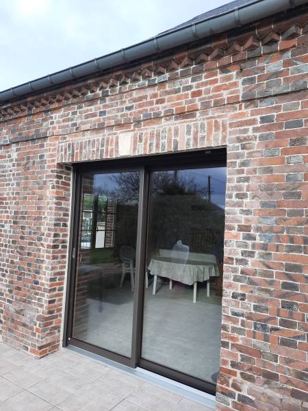 Pose coulissant bi-matière MINCO sur ouverture murale LEROY FERMETURES