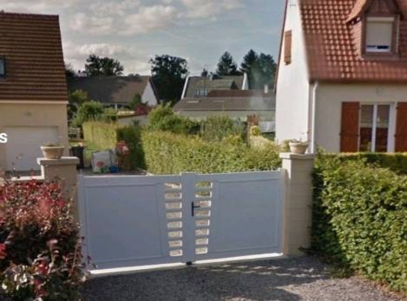 Faire appel à un professionnel pour l'installation d'un portail motorisé à deux battants proche d'Évreux 27