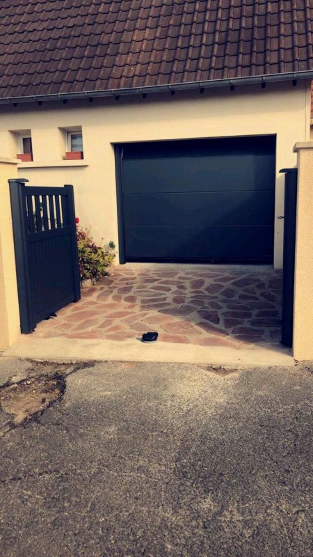 Installer une porte de garage coulissante près de Elbeuf 76